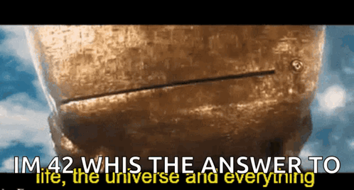 A Statue With The Words Im 42 Whis The Answer To Life The Universe And Everything Written Below It GIF
