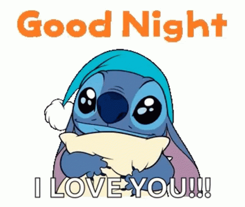 a stitch holding a pillow with the words good night i love you