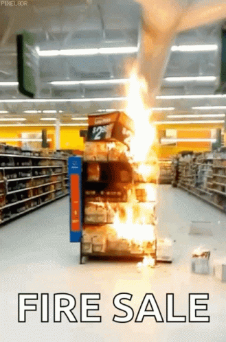 A Store Aisle With A Fire Sale Sign GIF