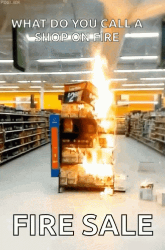 A Store Aisle With A Stack Of Boxes On Fire And The Words " What Do You Call A Shop On Fire Fire Sale " GIF