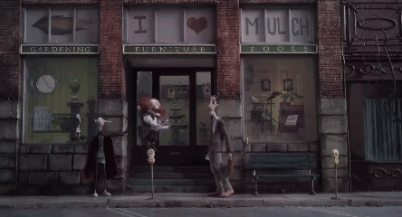 A Store Front With A Sign That Says I Love Mulch Tools GIF