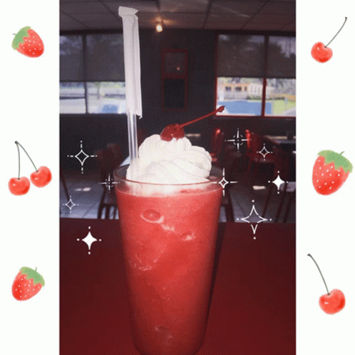 A Strawberry Milkshake With Whipped Cream And A Cherry On Top Of It GIF