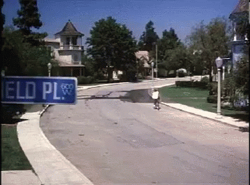 A Street Sign Says Eld Pl On It GIF