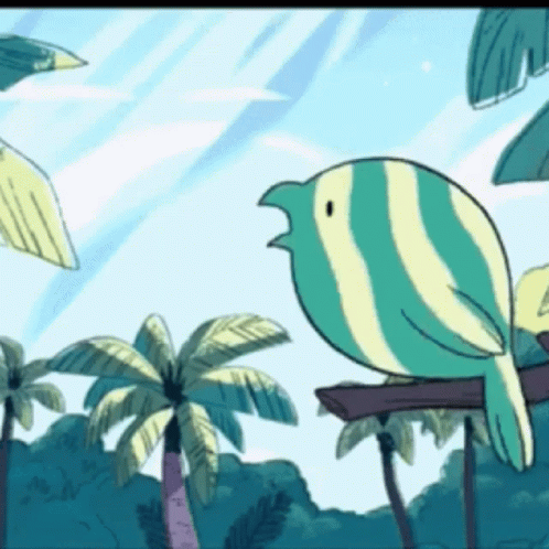 A Striped Bird Is Perched On A Tree Branch GIF