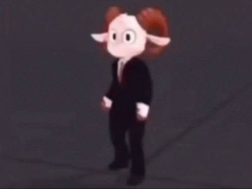 A Stuffed Animal In A Suit And Tie Is Running Across A Dark Street . GIF