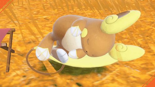 Stuffed Animal On Yellow Pillow N GIF