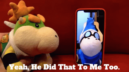 A Stuffed Animal Next To A Cell Phone That Says " Yeah He Did That To Me Too " GIF