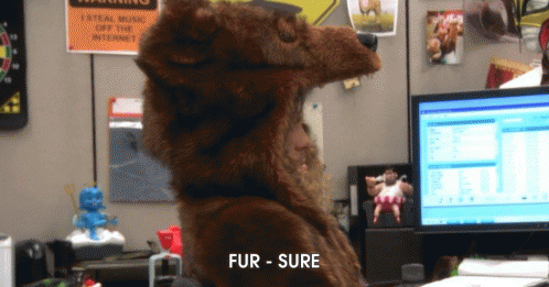 A Stuffed Animal Wearing A Bear Costume Says Fur Sure GIF