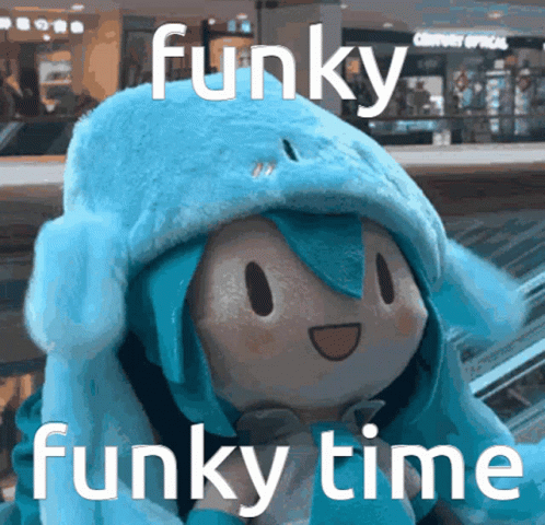 A Stuffed Animal Wearing A Blue Hat That Says Funky Time GIF