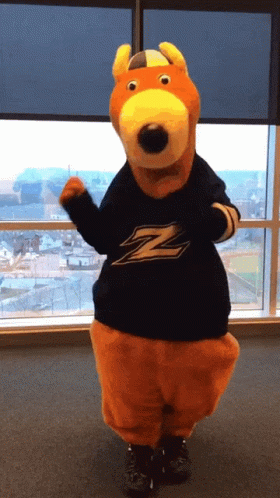 a stuffed animal wearing a shirt that says z on it