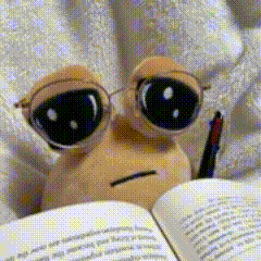 A Stuffed Animal Wearing Glasses Is Reading A Book With A Pen GIF