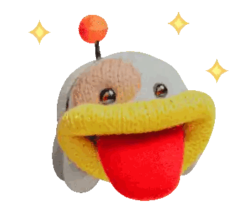a stuffed animal with a red tongue sticking out is surrounded by stars
