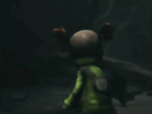 A Stuffed Animal With Pigtails And A Gas Mask GIF