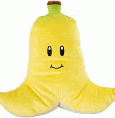 A Stuffed Banana With A Smiley Face On Its Face GIF