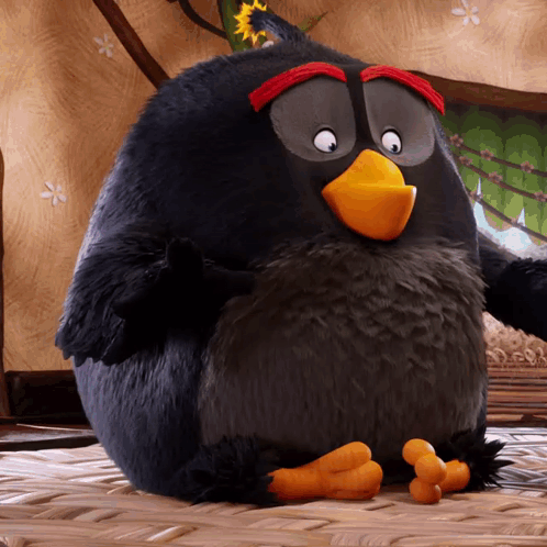 Stuffed Black Bird With Yellow Beak GIF