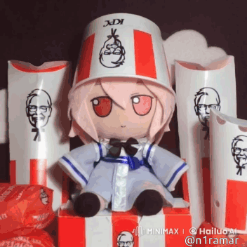 A Stuffed Doll Wearing A Kfc Bucket Hat Is Sitting In A Box GIF