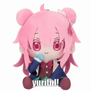A Stuffed Doll With Pink Hair And The Words Yuriful Written On It GIF