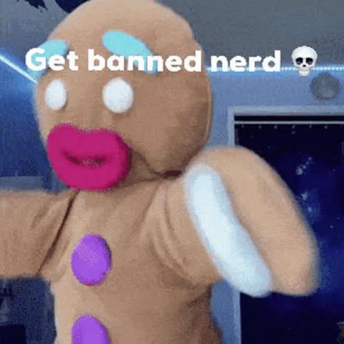 A Stuffed Gingerbread Man With The Words Get Banned Nerd On The Bottom GIF