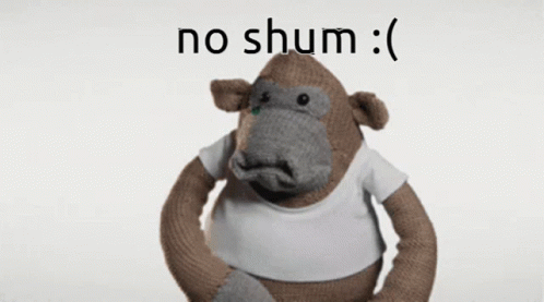 A Stuffed Gorilla Wearing A White Shirt With The Words No Shum Written On It GIF
