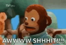 A Stuffed Monkey Is Talking On A Cell Phone And Says Awww Shhhit !!! GIF