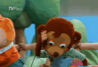 A Stuffed Monkey With A Tv Peru Logo On The Bottom Left GIF