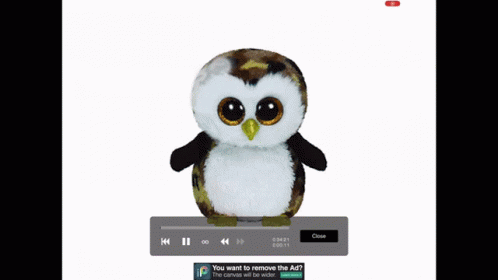 A Stuffed Owl That Is Made In Italy Is Sitting On A Blue Background GIF