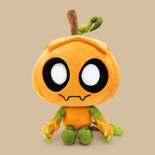 A Stuffed Pumpkin With Glowing Eyes And Green Arms GIF