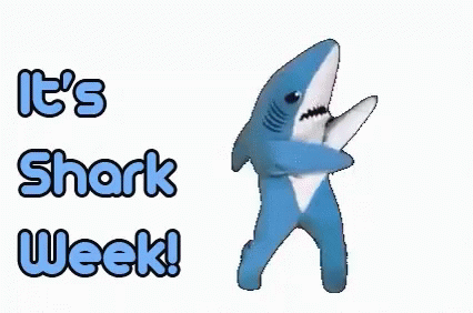 A Stuffed Shark Is Dancing In Front Of The Words It 'S Shark Week ! GIF