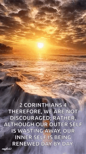 A Sunset Over A Body Of Water With A Bible Verse GIF