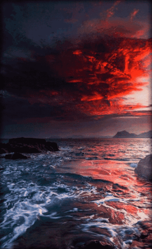 Sunset Over Water With Mountain Background GIF
