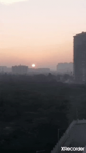 A Sunset Over A City With A Xrecorder Watermark GIF