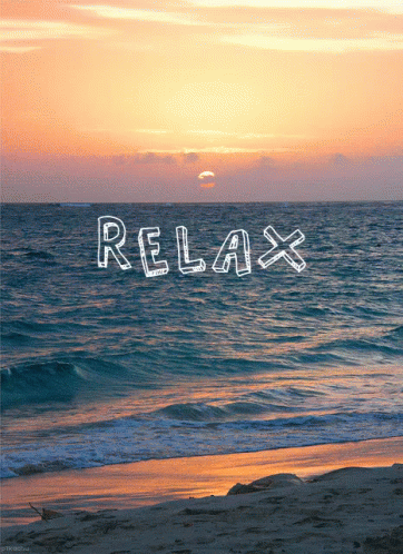 A Sunset Over The Ocean With The Word Relax Written In The Water GIF