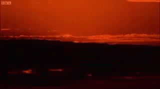 A Sunset With The Bbc Logo In The Upper Right Corner GIF