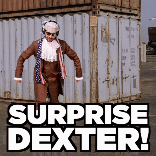 A Surprise Dexter Advertisement With A Man In A Suit GIF