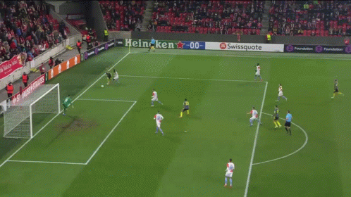 A Swiss Uote Sign Is Behind A Soccer Goalie GIF