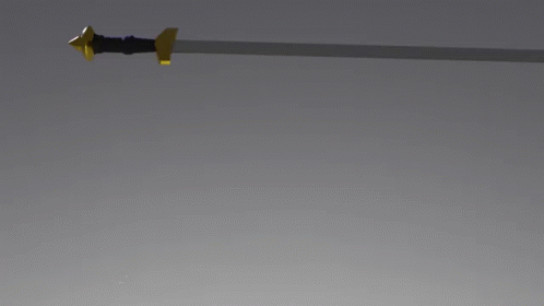 A Sword With A Gold Handle Is Laying On A Gray Surface GIF