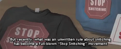 A T-Shirt With A Stop Sign On It Sits On A Table GIF