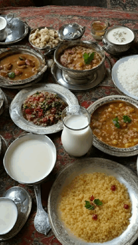 A Table Topped With A Variety Of Food Including Rice And Milk GIF