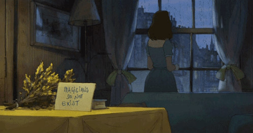 A Table With A Sign That Says Magicians Do Not Exist On It GIF