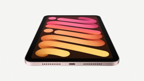 A Tablet With A Rainbow Colored Screen Has A Swirl Pattern On It GIF