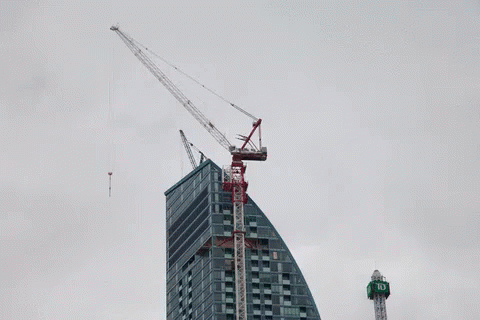 A Td Bank Tower Is Being Built Next To A Very Tall Building GIF