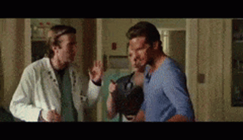 A Team Doctors Noticing The Stitches GIF