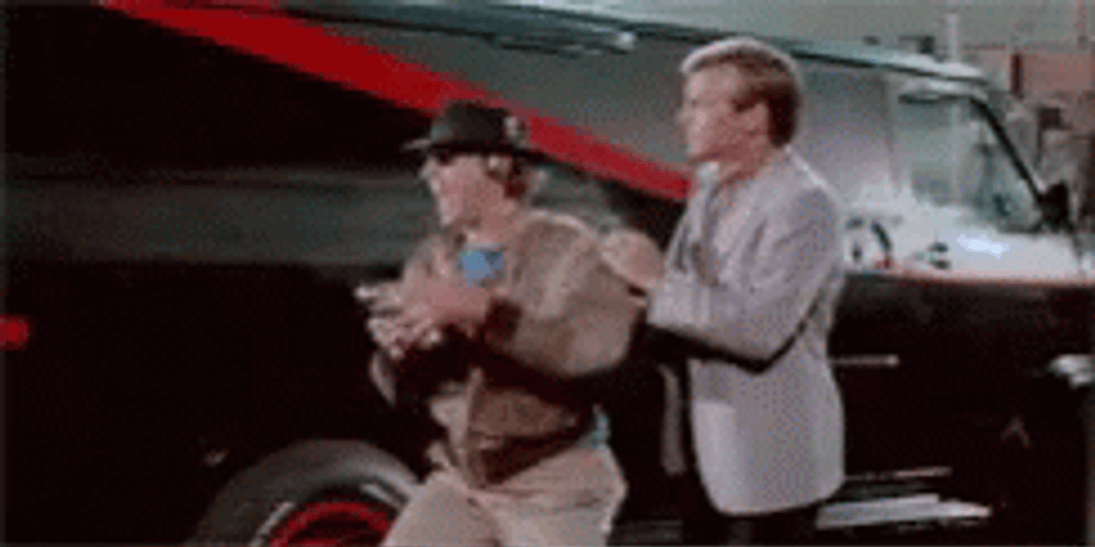A Team Approaching The Truck GIF