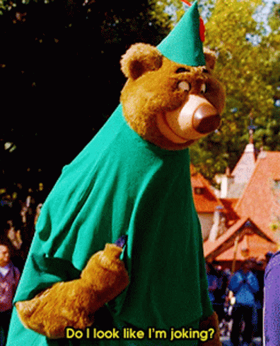 A Teddy Bear In A Green Outfit Says Do I Look Like I M Joking GIF
