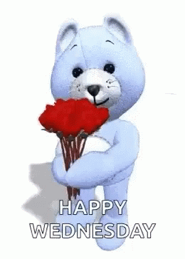 A Teddy Bear Is Holding A Bouquet Of Red Roses And Saying Happy Wednesday . GIF