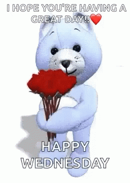 A Teddy Bear Is Holding A Bouquet Of Red Roses And Says Happy Wednesday . GIF