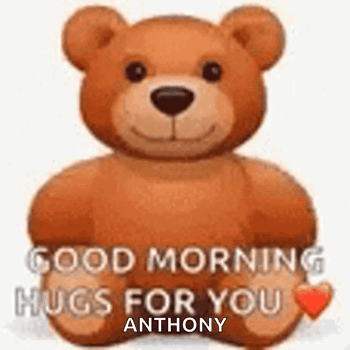 A Teddy Bear Is Holding A Heart And Says `` Good Morning Hugs For You '' . GIF