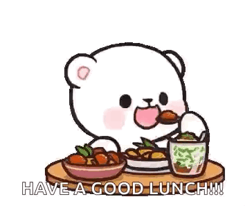 A Teddy Bear Is Sitting At A Table Eating A Meal . GIF