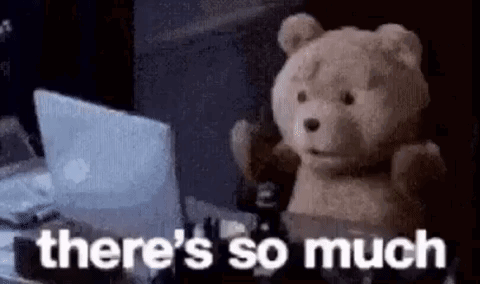 A Teddy Bear Is Sitting In Front Of A Laptop Computer With The Words `` There 'S So Much '' . GIF