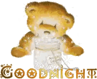 a teddy bear is sitting next to a jar that says goodnight on it